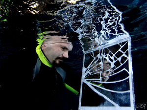 Portrait of a broken mirror under water.
Taken in swimmi... by Veronika Matějková 